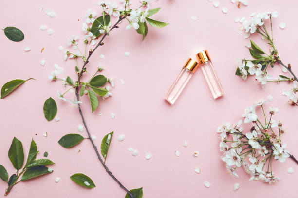 istock Two bottles of perfume with apricot blossom 956177070