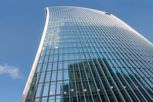 istock Roof and glass facade of modern skyscraper 956180322