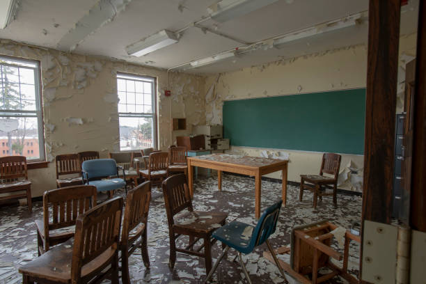 chairs inside abandoned classroom - paint lead peeling peeled imagens e fotografias de stock