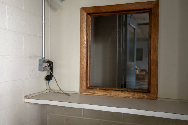 Phone used by visitors at abandoned prison stock photo