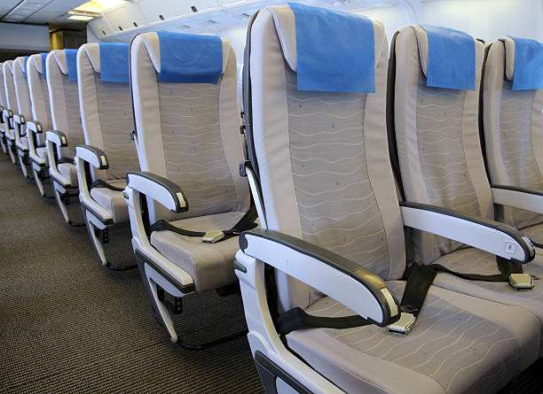 istock A row of airline seats in a plane 95618887