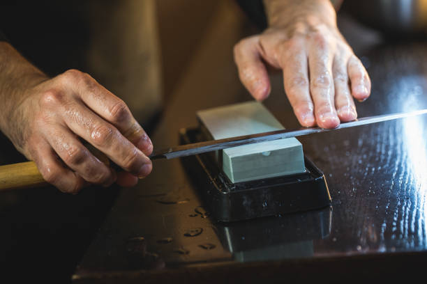 istock japanese chef sharpening japanese knife 956192390