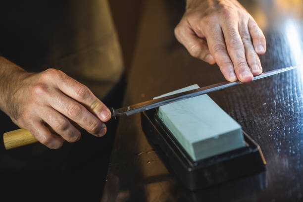 istock japanese chef sharpening japanese knife 956192392