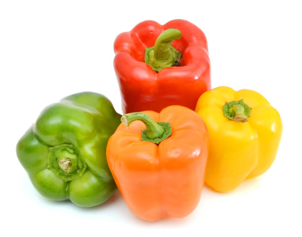 istock colorful peppers over white background 956193592