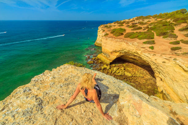 istock Algarve coast woman 956200054