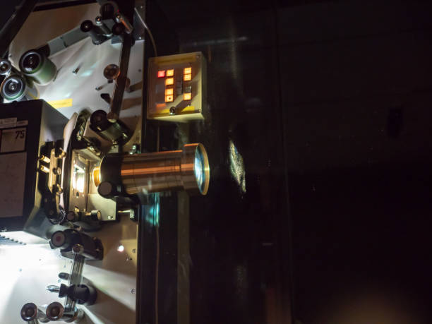 istock A projector displaying a film in a dark room 956217768