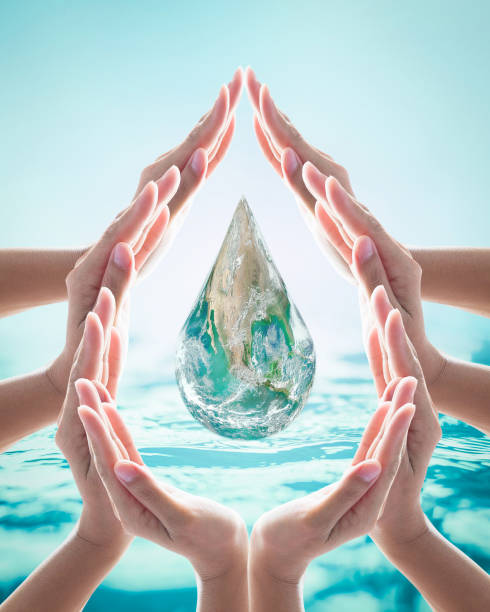 istock World water day, saving bio natural environment concept with hands in drop water cycle. Element of the image furnished by NASA 956218368