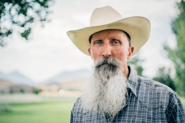 Portrait of a Senior Cowboy with long white beard