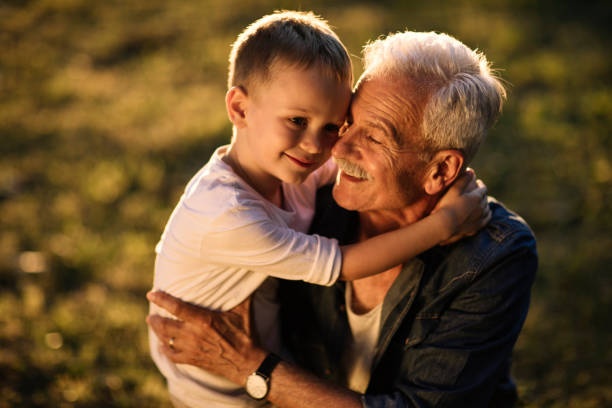 istock Grandchild-grandfather affection 956221350