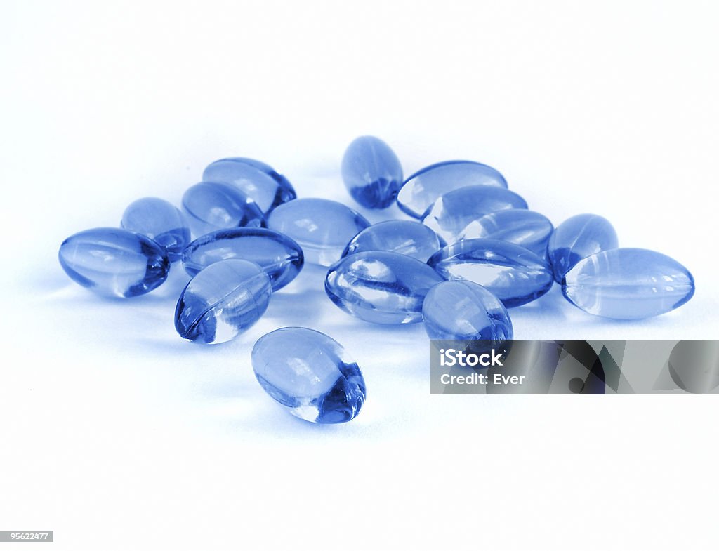 Голубые таблетки - Стоковые фото Абстрактный роялти-фри