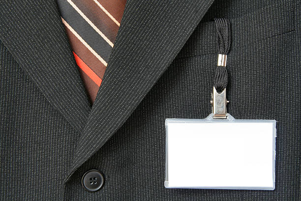 istock Name tag hanging from pocket of suit jacket 95622659