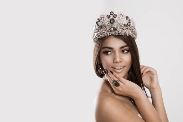 istock A beauty queen brunette woman looking back 956227548