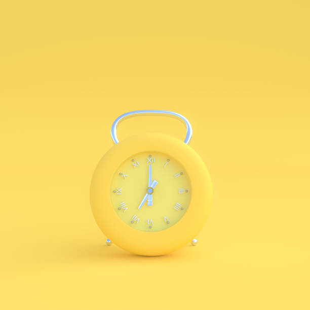 istock modern clock pastel yellow color on yellow background 956230688