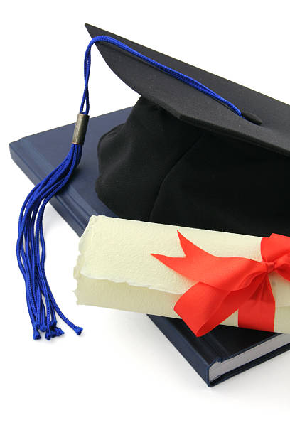 graduation cap und Diplom – Foto