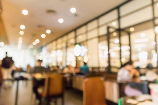 istock Restaurant cafe or coffee shop interior with people abstract defocused blur background 956230842