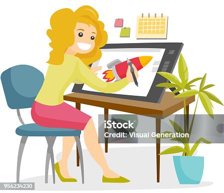 istock A white woman graphic designer works at the office desk 956234230