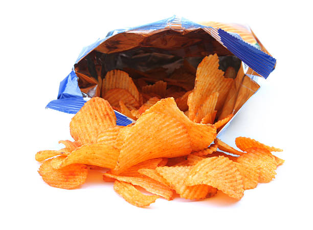 istock Open bag of potato chips spilling out 95623576