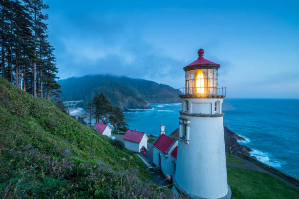 istock Regal View Heceta Head Lighthouse Shining Across Oregon Coast 956244514