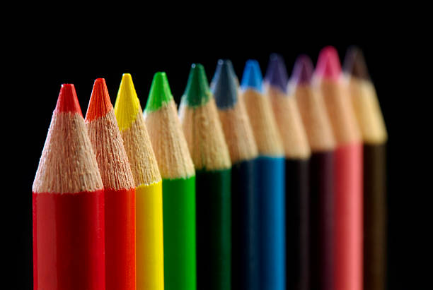 Row of colored pencils stock photo
