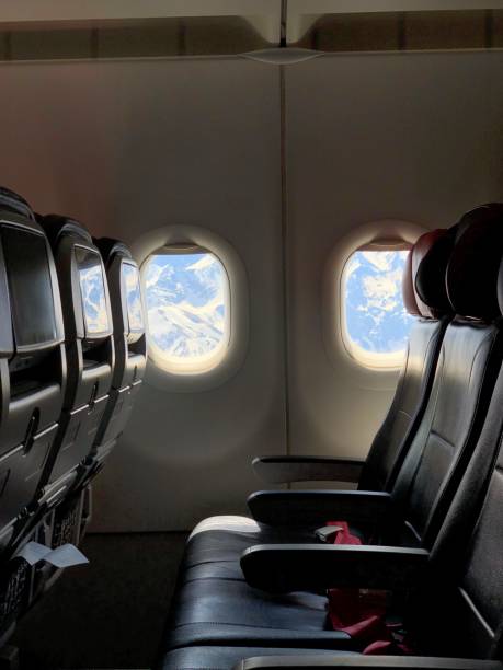 istock Airplane passenger seat looks like mountains with claws 956250116
