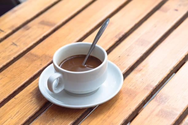 istock Traditional Vietnamese milk coffee in ceramic cup and saucer 956250578