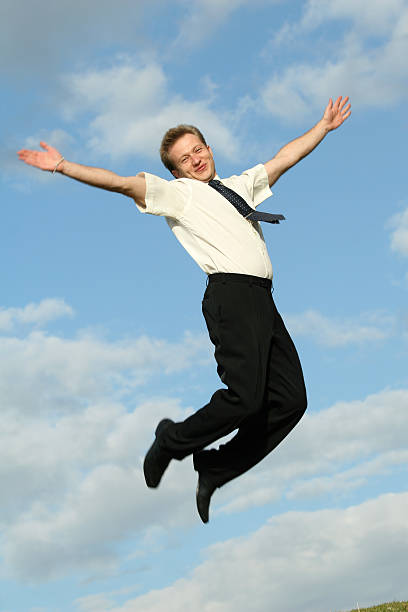 istock happy jumping businessman 95626180
