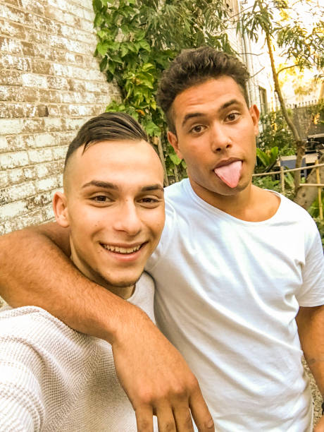 istock Australian Aboriginal and Middle Eastern Young Men Taking Selfies 956261842