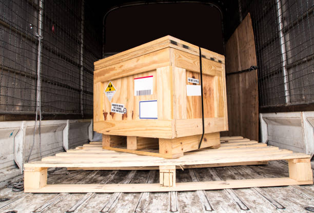 Radiation label beside the transport wooden box Type A package in the truck Radioactive material label beside the transportation wooden box Type A standard package in the truck crate stock pictures, royalty-free photos & images