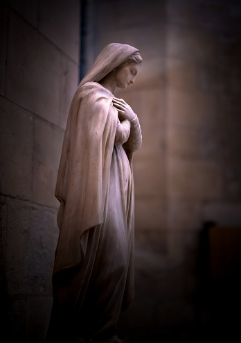 Statue of religious woman Sacre Coeur