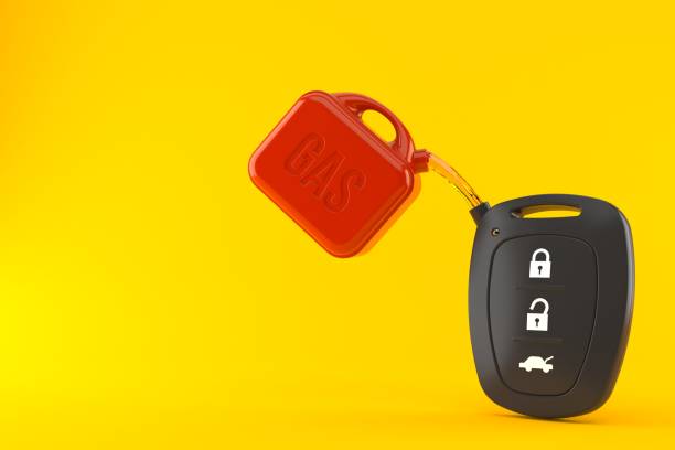 istock Car remote key with gasoline can 956265986