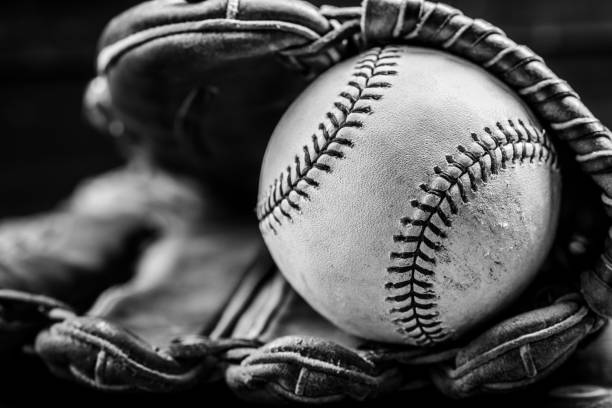 istock Vintage baseball gear on a wooden background 956272644