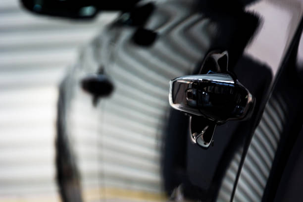 istock Luxury car interior details. Dashboard and steering wheel 956273752