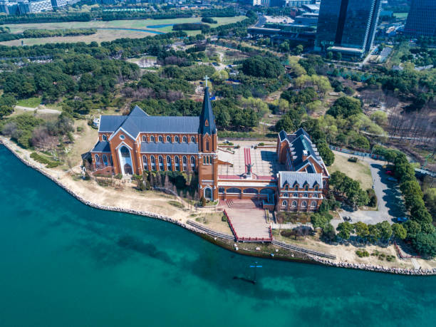 Aerial photography of a lakeside church Aerial photography of a lakeside church govan stock pictures, royalty-free photos & images