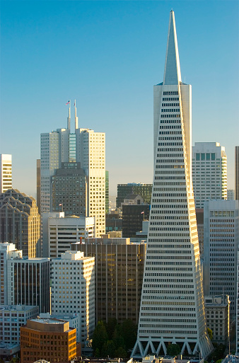 Skyscrapers in the financial district of San Francisco, California, USA, seen from low angle upwards during daytime.