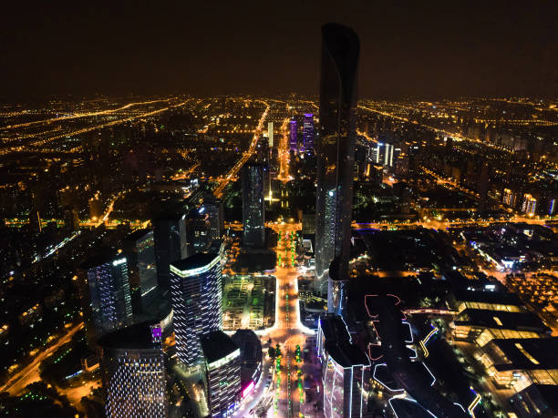 istock Night view of modern city business district 956276878