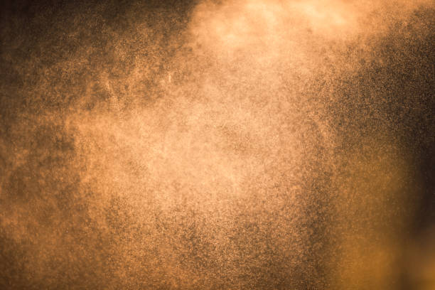 istock Background - splashes of water in backlighting from the setting sun 956280862