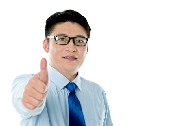 istock Asian businessman with thumbs up 956285714