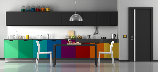 Colorful modern kitchen with dining table and chairs - 3d rendering\nNote: the room does not exist in reality, Property model is not necessary