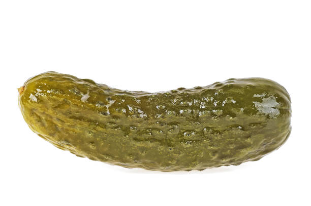 istock Fresh green pickled cucumber isolated over white background 956297840
