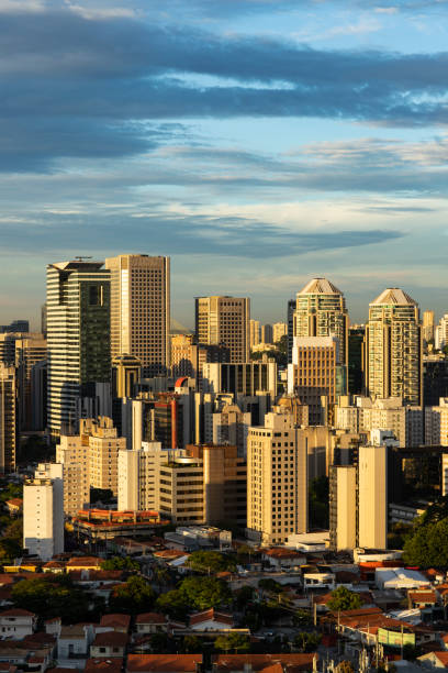 istock beautiful clouds, buildings and homes, Brazil 956301310