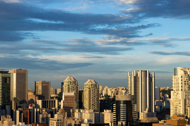 istock beautiful clouds, buildings and homes, Brazil 956301520