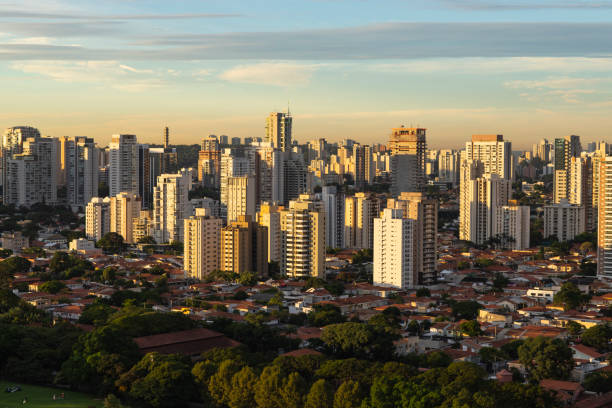 istock beautiful clouds, buildings and homes, Brazil 956301526