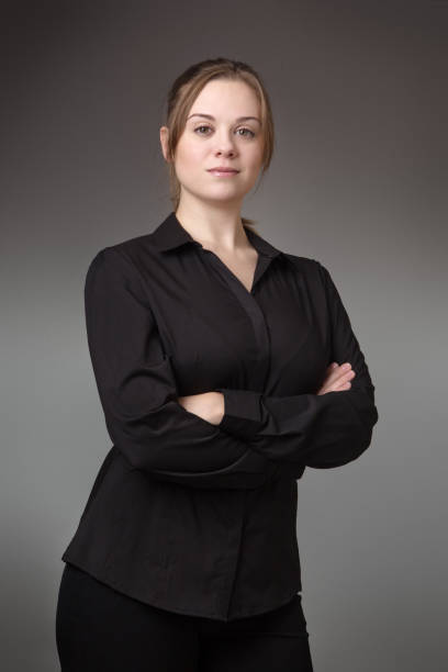 istock standing business woman 956302170