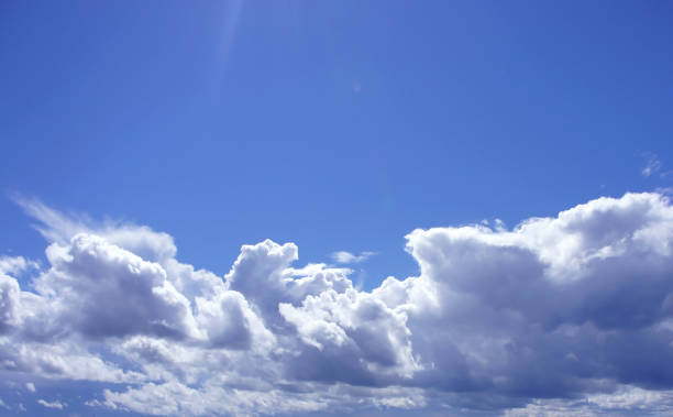 istock Beautiful cumulonimbus clouds in the blue sky. Background. 956311472