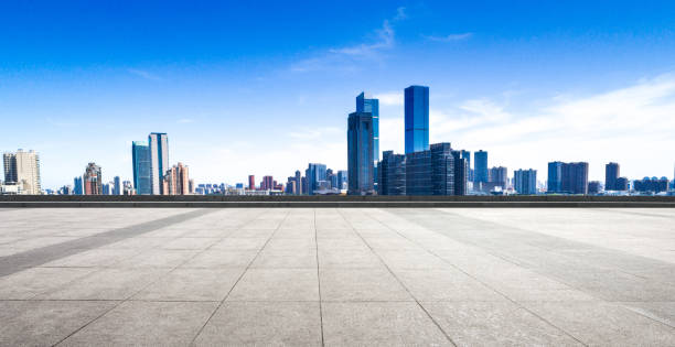 istock Empty floor with modern business office building 956312288