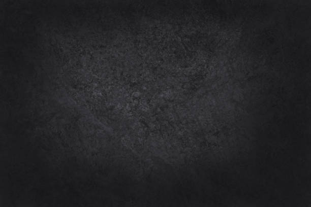 istock Dark grey black slate texture in natural pattern with high resolution for background and design art work. Black stone wall. 956315584