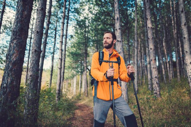 istock Man hiking in the mountain 956316036