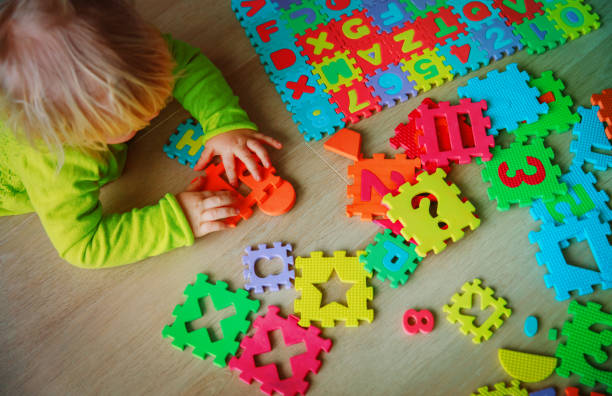 istock little baby girl learning numbers and math 956317474