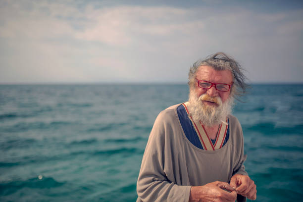 istock Old fisherman by the sea 956321352