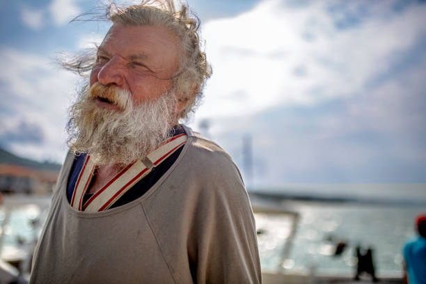 istock Old fisherman by the sea 956321682